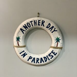 Another Day in Paradise Sign