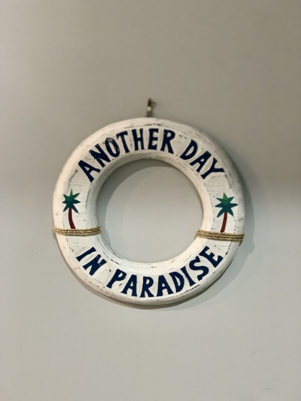 Another Day in Paradise Sign
